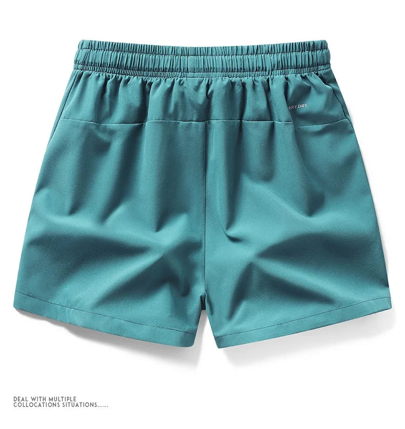 Shorts esportivos unissex com bolsos zíper.