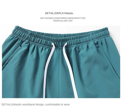 Shorts esportivos unissex com bolsos zíper.