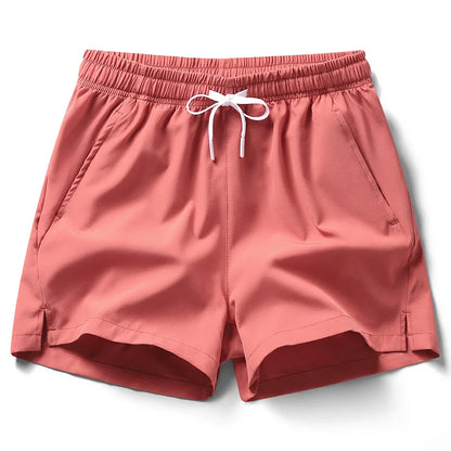 Shorts esportivos unissex com bolsos zíper.