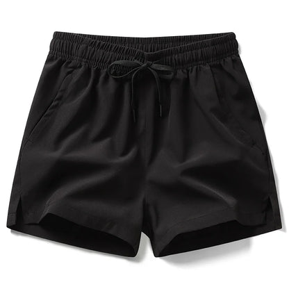 Shorts esportivos unissex com bolsos zíper.